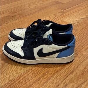 Nike Navy and Cream Jordan 1 low obsidian.